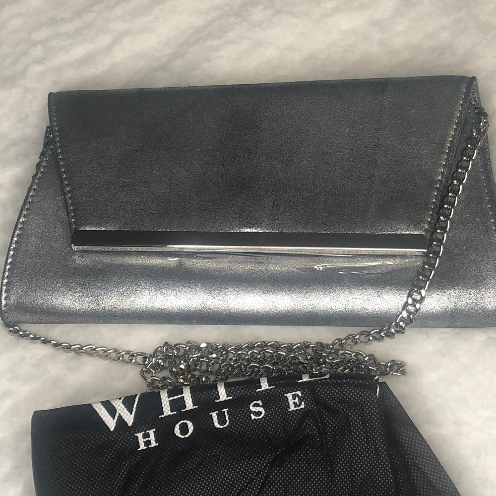 Authentic New WHBM silver clutch